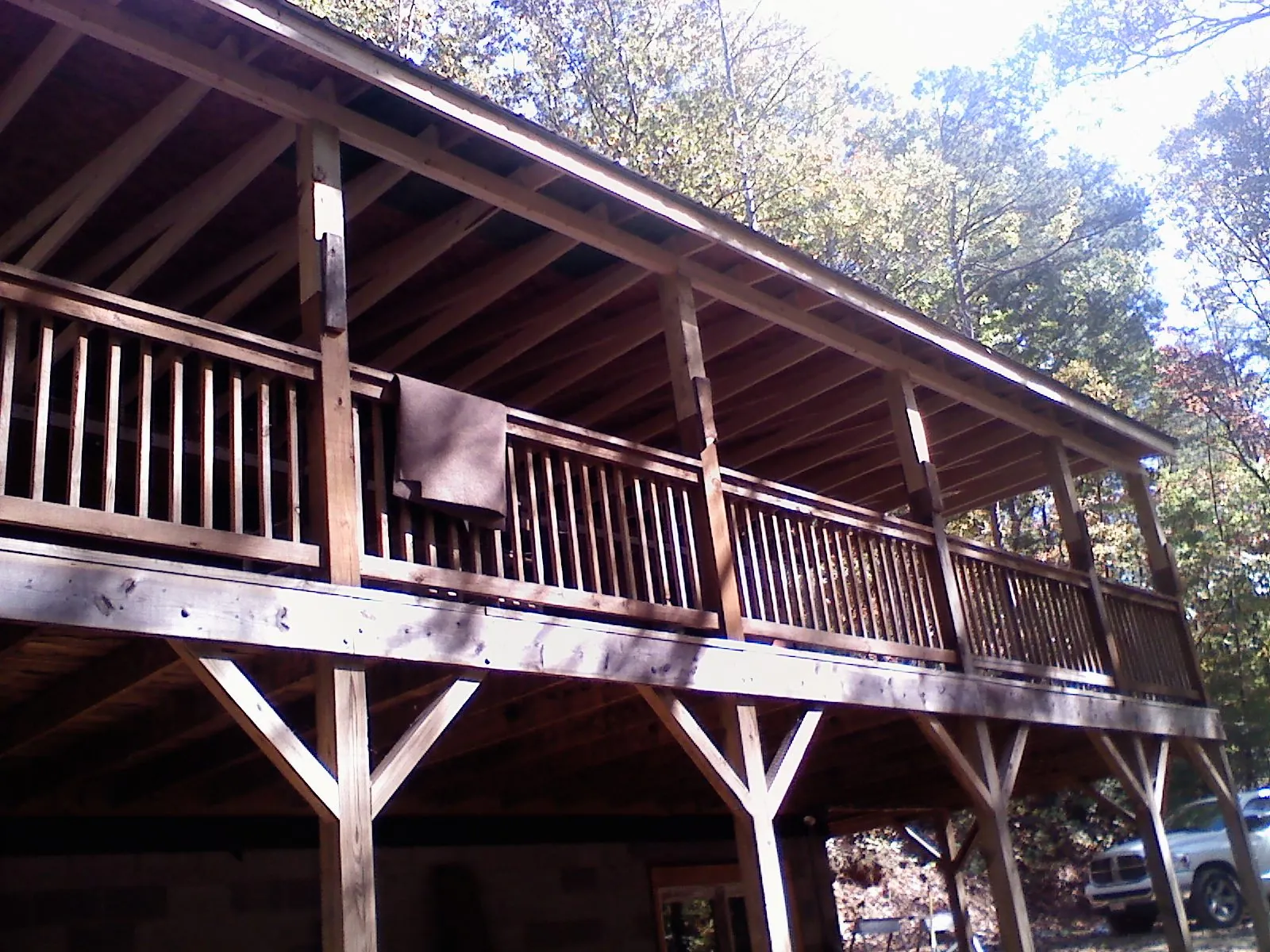 Timber framing under a new elevated porch and deck — Roof Leak Repair in Saint Thomas by Roofing Brothers